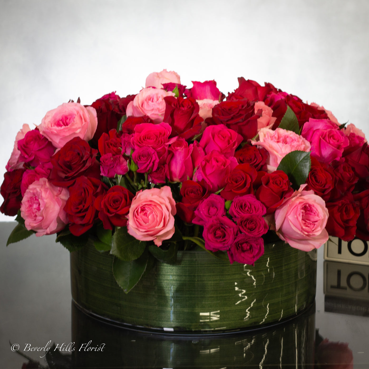 100 Blooms of Love in a glass vase with white, pink, and red fresh flowers, same-day delivery by Beverly Hills Florist.