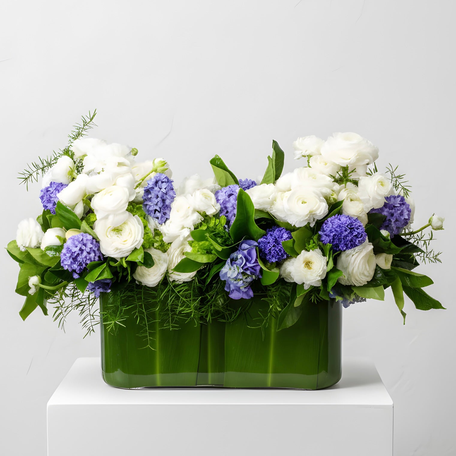 Blue hyacinths and white seasonal flowers arrangement | Beverly Hills Florist