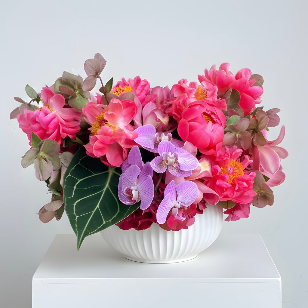 Rachel — coral peonies and pink orchids arrangement | Beverly Hills Florist