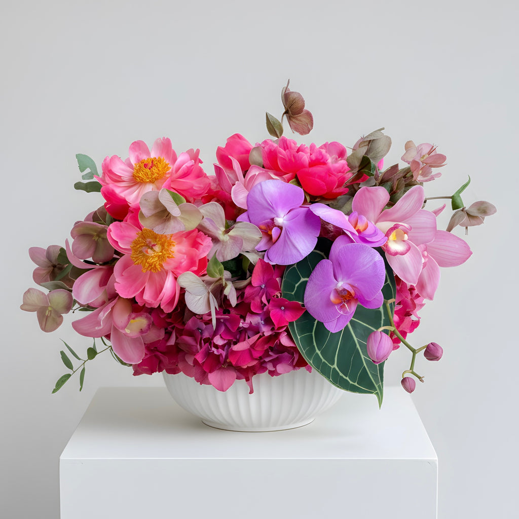 Rachel — coral peonies and pink orchids arrangement | Beverly Hills Florist