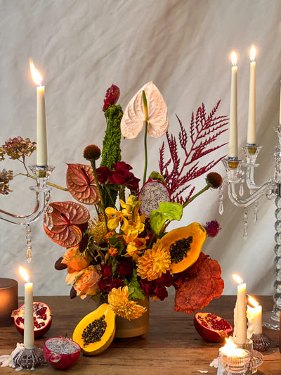 Lush arrangement of amaranths, anthuriums, and vibrant papayas in a white vase – Elegant Blooming Beauty, available for same-day delivery by Beverly Hills Florist.