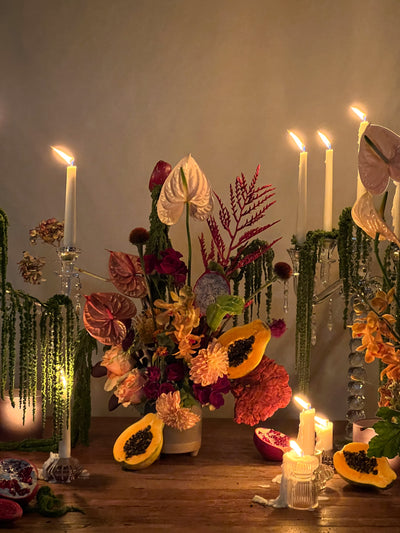 Lush arrangement of amaranths, anthuriums, and vibrant papayas in a white vase – Elegant Blooming Beauty, available for same-day delivery by Beverly Hills Florist.