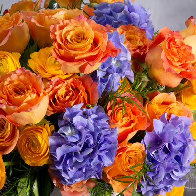 The Tale of Orange Roses and blue hydrangeas