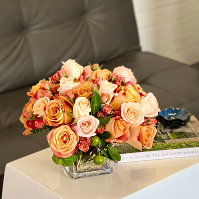 Blooms of Sunshine arrangement with fresh orange flowers, designed for vibrant decor, available for same-day delivery by Beverly Hills Florist.