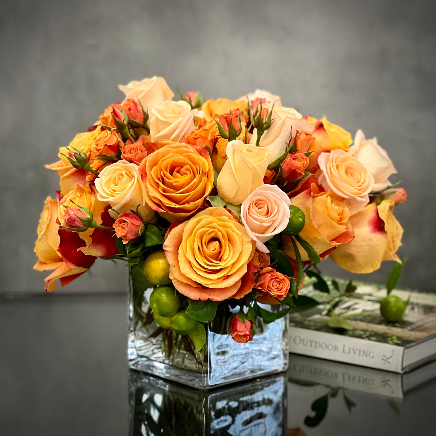 Blooms of Sunshine arrangement with fresh orange flowers, designed for vibrant decor, available for same-day delivery by Beverly Hills Florist.