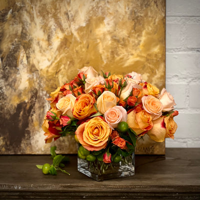 Blooms of Sunshine arrangement with fresh orange flowers, designed for vibrant decor, available for same-day delivery by Beverly Hills Florist.