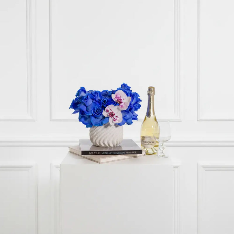 Blue Lagoon arrangement with blue accent blooms | Beverly Hills Florist