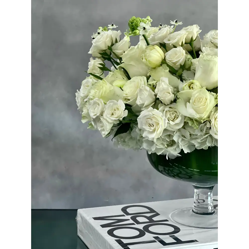Capture The Heart arrangement with white roses and seasonal flowers in a pedestal vase, available for same-day delivery by Beverly Hills Florist.