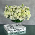 Capture The Heart arrangement with white roses and seasonal flowers in a pedestal vase, available for same-day delivery by Beverly Hills Florist.