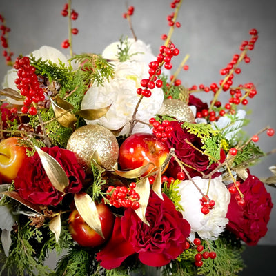 Designer Choice - Festive arrangement with vibrant holiday blooms, customizable with upgrades, available for same-day delivery by Beverly Hills Florist.