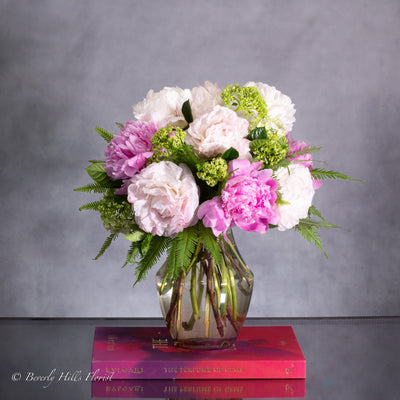 Ethereal Elegance floral arrangement with pink and white peonies in a sleek vase – available for same-day delivery by Beverly Hills Florist.