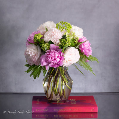 Ethereal Elegance floral arrangement with pink and white peonies in a sleek vase – available for same-day delivery by Beverly Hills Florist.