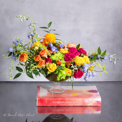 Garden Fairytale Flower Arrangement in Glass Pedestal Vase
Whimsical Rose and Delphinium Bouquet Same-Day Delivery Beverly Hills
Vibrant Garden Fairytale Floral Arrangement for Los Angeles
Elegant Glass Vase with Roses, Delphiniums, and Hydrangeas