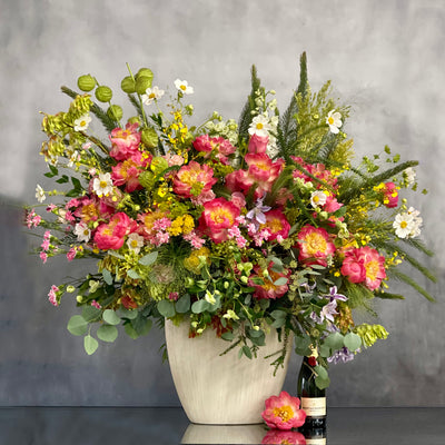 Grand floral arrangement with peonies, cosmos, and wild florals in a white ceramic vase – 4.5 feet tall, available for same-day delivery by Beverly Hills Florist.