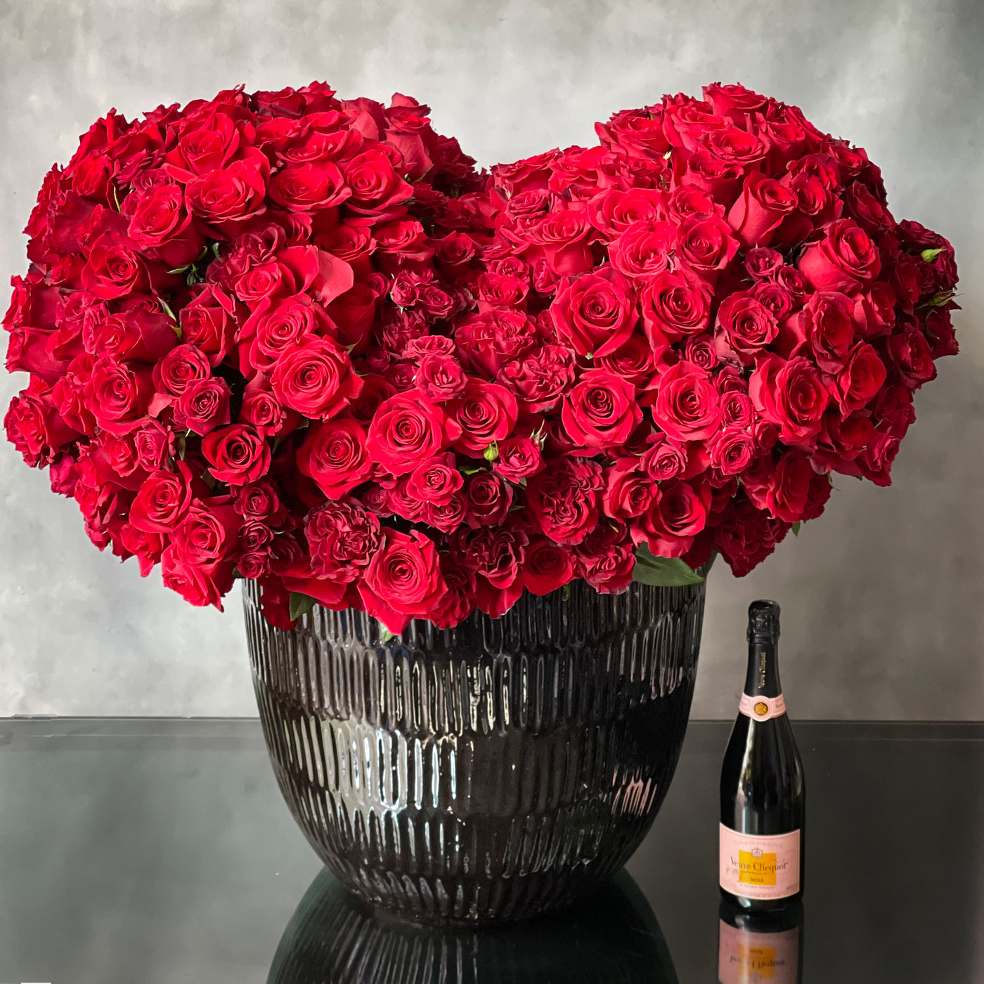 Layers and Layers of Love arrangement with over 1,001 red roses, standing 3 feet tall and 4 feet wide, available for same-day delivery by Beverly Hills Florist.