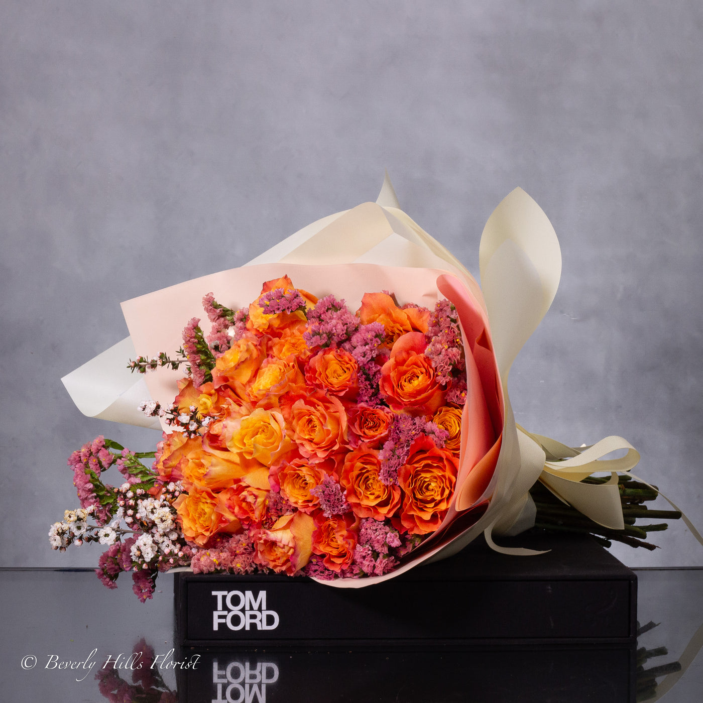 Orange Two-Tone Fragrant Rose Hand Bouquet with vibrant orange hues and delicate fragrance for same-day delivery in Beverly Hills.