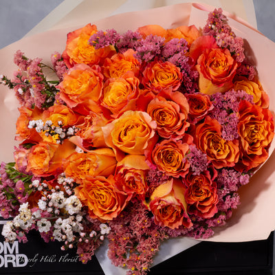 Orange Two-Tone Fragrant Rose Hand Bouquet with vibrant orange hues and delicate fragrance for same-day delivery in Beverly Hills.