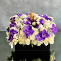 Luxury square flower box with white roses, purple and white Vanda orchids, and Veuve Clicquot champagne by Beverly Hills Florist