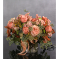 This exquisite arrangement captures the essence of fall romance, Beverly Hills style. Delicate peach garden roses, symbolizing gratitude and appreciation, are artfully paired with airy seeded eucalyptus, creating a sense of effortless beauty. Perfect for any special occasion or a luxurious touch to your home.