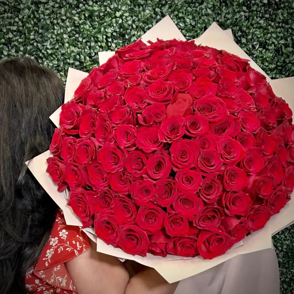 Layers and Layers of Love arrangement with over 1,001 red roses, standing 3 feet tall and 4 feet wide, available for same-day delivery by Beverly Hills Florist.