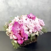My Beverly Hills Florist offers same day delivery. This piece includes Orchids and pink Roses placed in a wooden box. Perfect for Birthdays, Romance, Thank you's and welcomes !