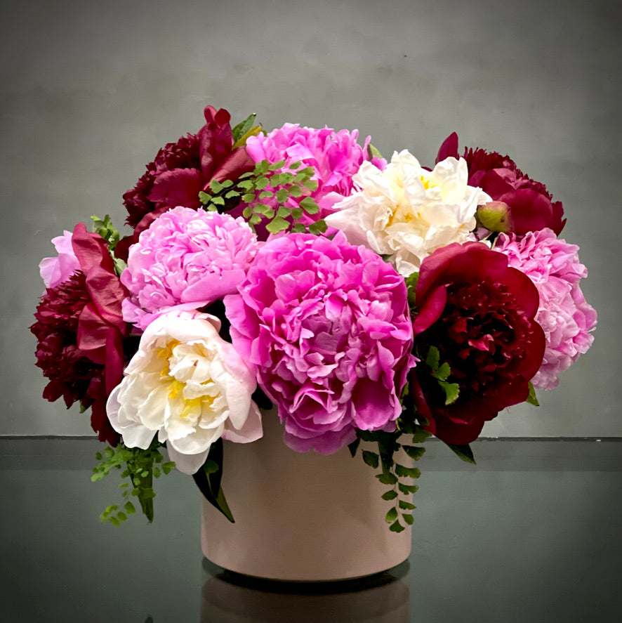 Beverly Hills Florist presents Peony Truffles for same day delivery! Peonies layered over delicate leaves ready for same day delivery. let our Beverly hills florist design team create an arrangement that is elegant, simple, and sophisticated. A beautiful sentiment for a Birthday, Thank you and Thinking Of You. 