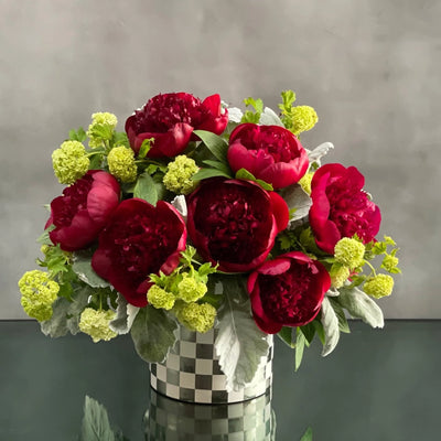This arrangement our team has created is available for same day delivery ! This floral piece from Beverly Hills Florist includes rich burgundy Peonies with green accents in a shiny checkered vase. Beautifully made for love and romance, birthday, i'm sorry or anniversary. 