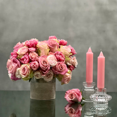 Amour arrangement with pink roses and tulips in a silver-textured vase, perfect for love and romance, available for same-day delivery by Beverly Hills Florist.