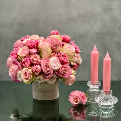 Amour arrangement with pink roses and tulips in a silver-textured vase, perfect for love and romance, available for same-day delivery by Beverly Hills Florist.