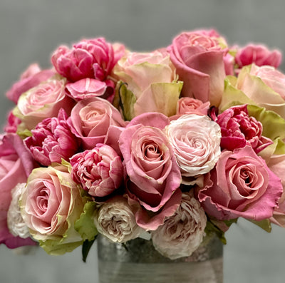 Amour arrangement with pink roses and tulips in a silver-textured vase, perfect for love and romance, available for same-day delivery by Beverly Hills Florist.