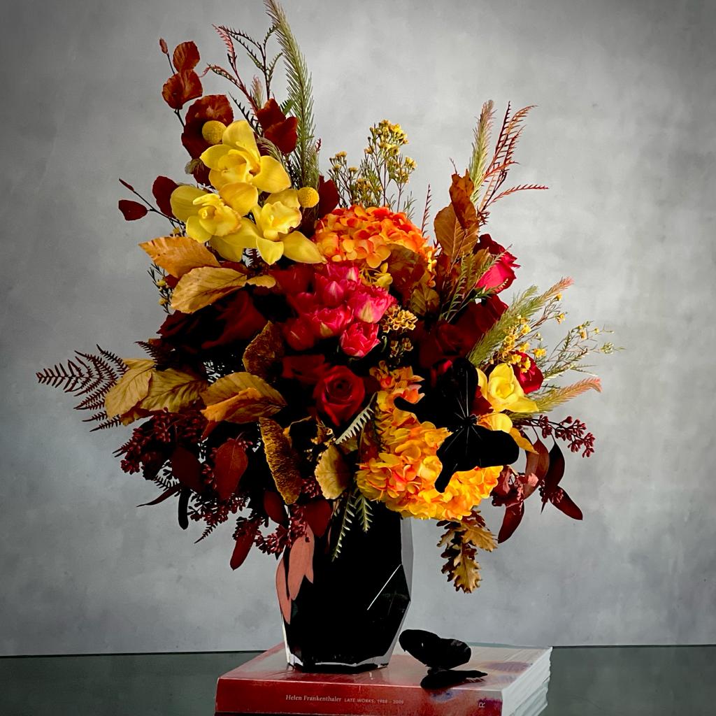 Autumn Sonata arrangement with local hydrangeas, South American roses, and Asian orchids in vibrant fall colors, available for same-day delivery by Beverly Hills Florist.