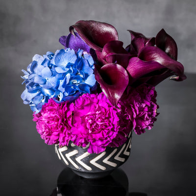 Blue Moonlight arrangement with blue, purple, and pink specialty flowers, available for same-day delivery by Beverly Hills Florist.