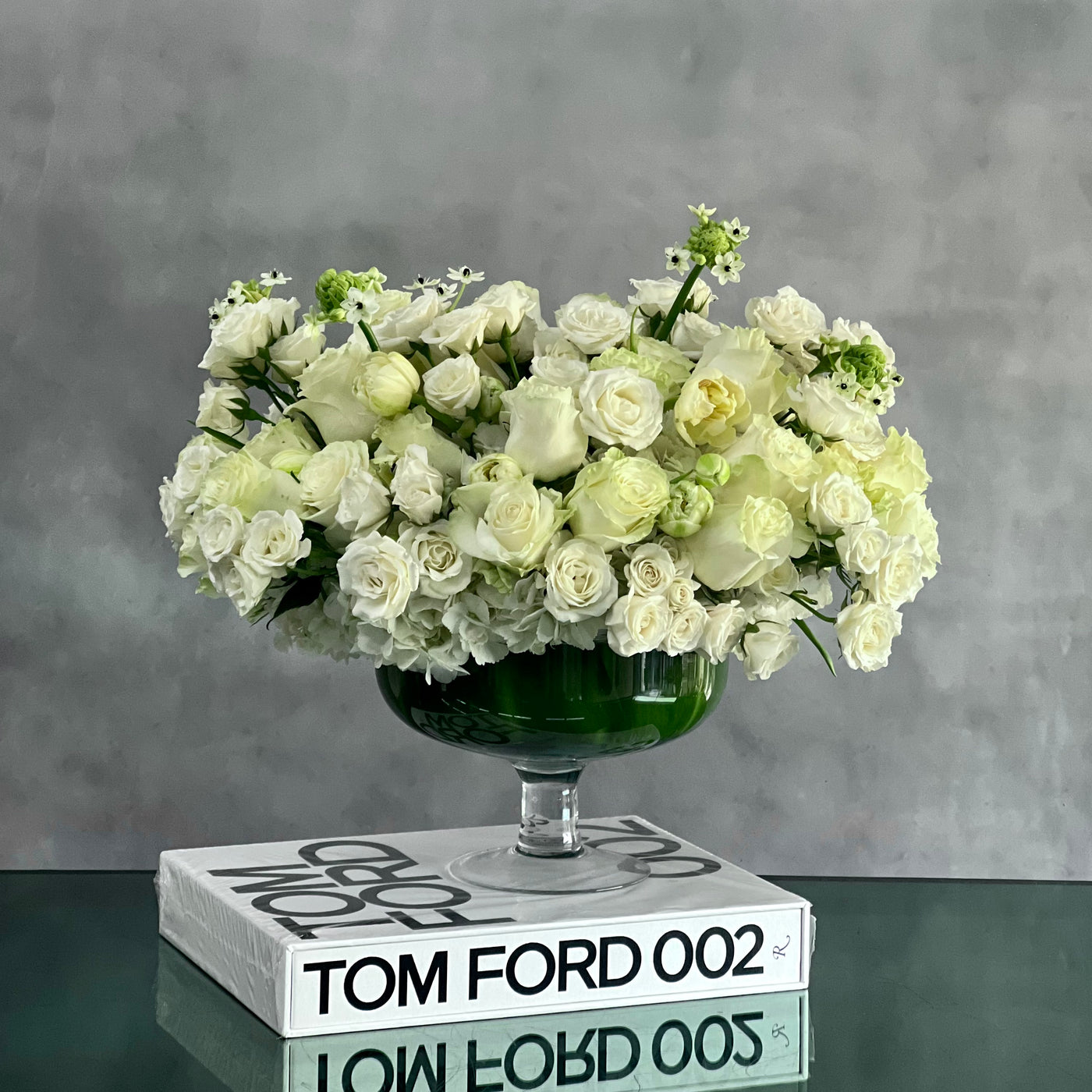 Capture The Heart arrangement with white roses and seasonal flowers in a pedestal vase, available for same-day delivery by Beverly Hills Florist.