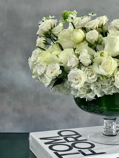 Capture The Heart arrangement with white roses and seasonal flowers in a pedestal vase, available for same-day delivery by Beverly Hills Florist.