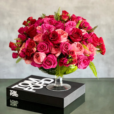 Love arrangement featuring red and hot pink roses in a 15-inch round design, available for same-day delivery by Beverly Hills Florist.