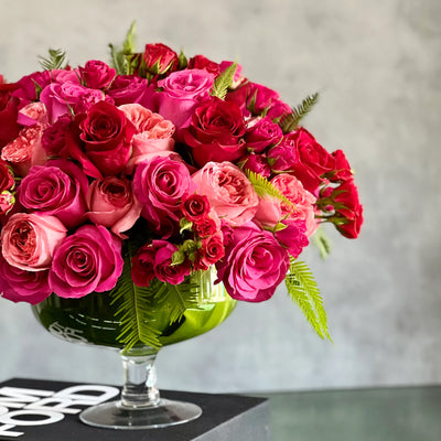 Love arrangement featuring red and hot pink roses in a 15-inch round design, available for same-day delivery by Beverly Hills Florist.