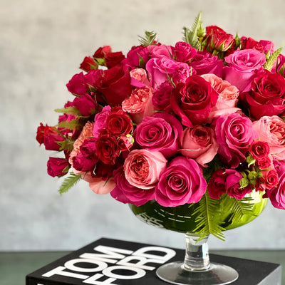 Love arrangement featuring red and hot pink roses in a 15-inch round design, available for same-day delivery by Beverly Hills Florist.