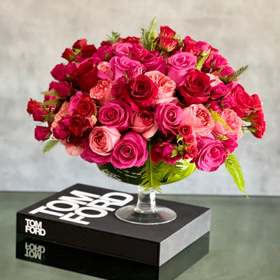 Love arrangement featuring red and hot pink roses in a 15-inch round design, available for same-day delivery by Beverly Hills Florist.