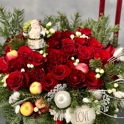 Red Holiday Box featuring over 36 red roses, holiday greens, berries, and festive ornaments, with dimensions 18 inches wide and 9 inches tall, available for same-day delivery in Beverly Hills.