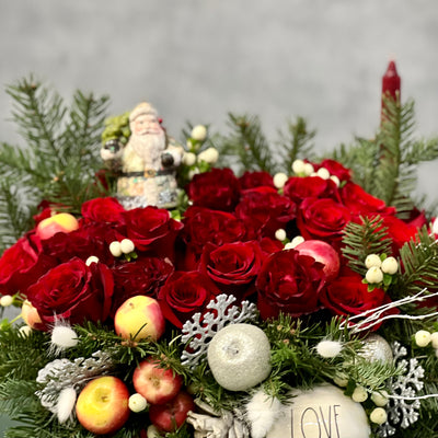 Red Holiday Box featuring over 36 red roses, holiday greens, berries, and festive ornaments, with dimensions 18 inches wide and 9 inches tall, available for same-day delivery in Beverly Hills.